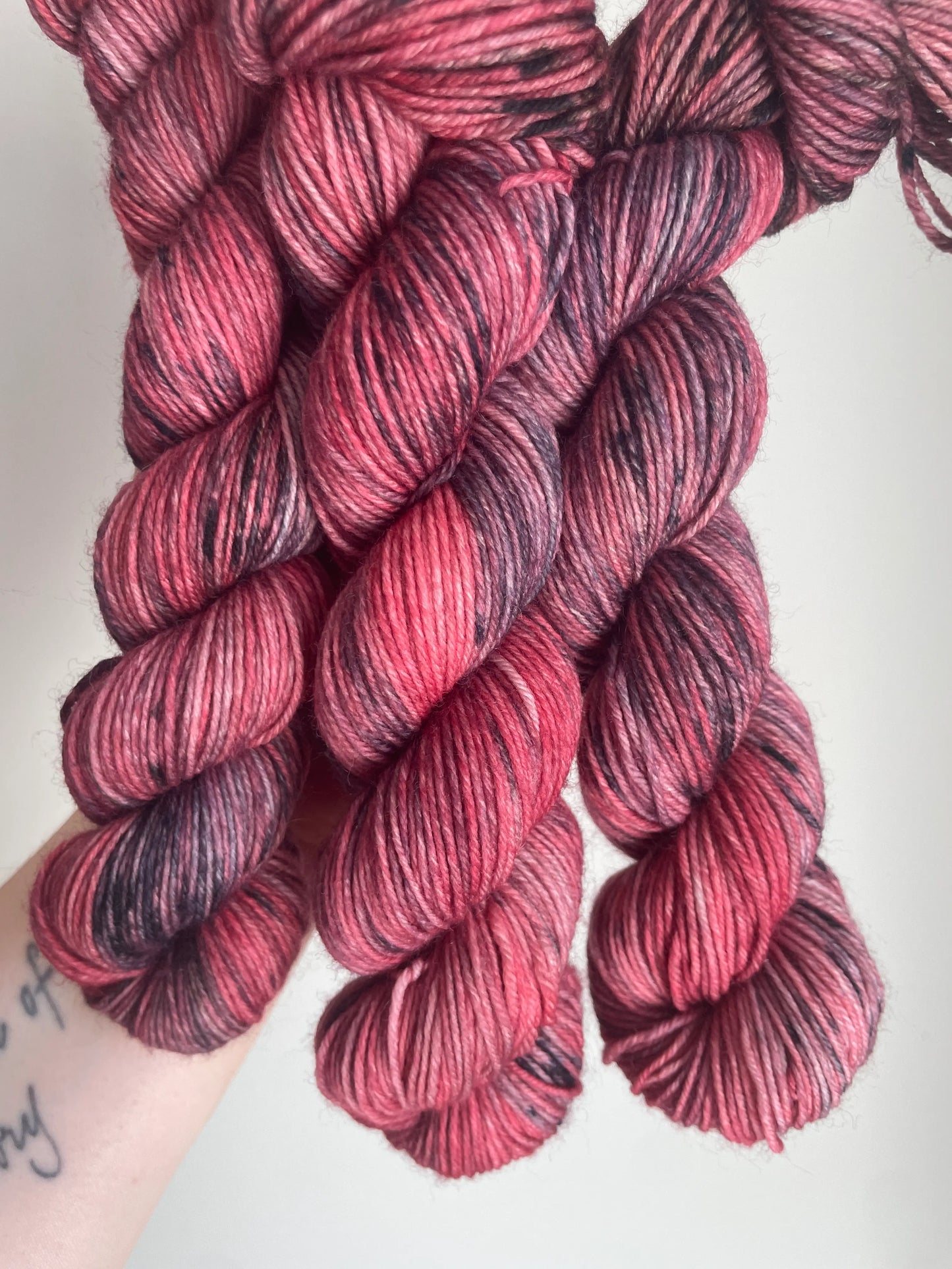 SockaMerino 50g ”Jordgubb/lakrits”