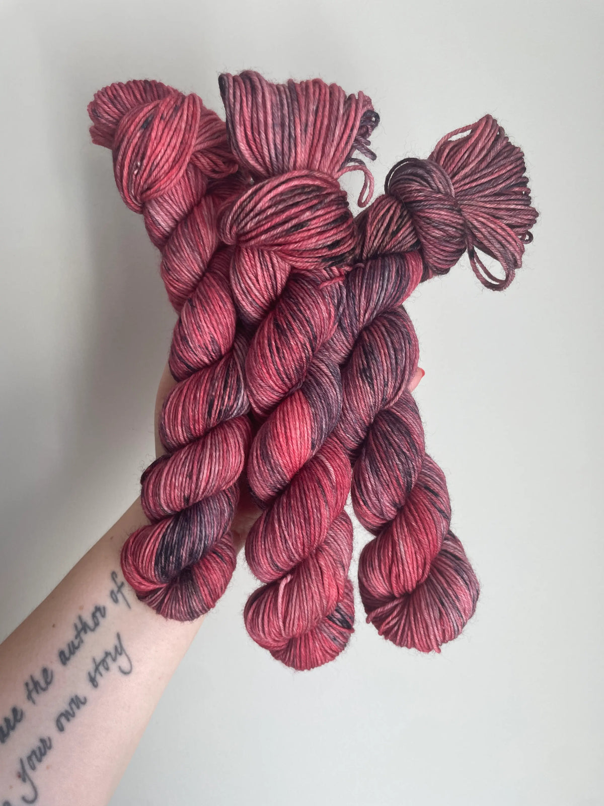 SockaMerino 50g ”Jordgubb/lakrits”